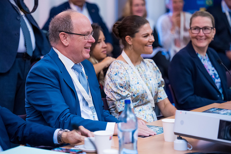 The Crown Princess with Prince Albert of Monaco during the seminar on coral reefs. 