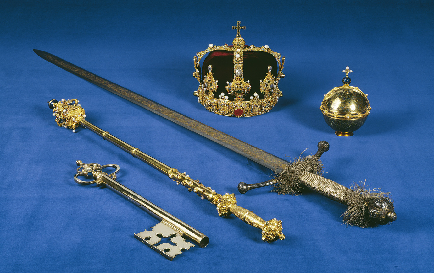 The main regalia (from left): the key, the sceptre, the sword, the crown and the orb. 