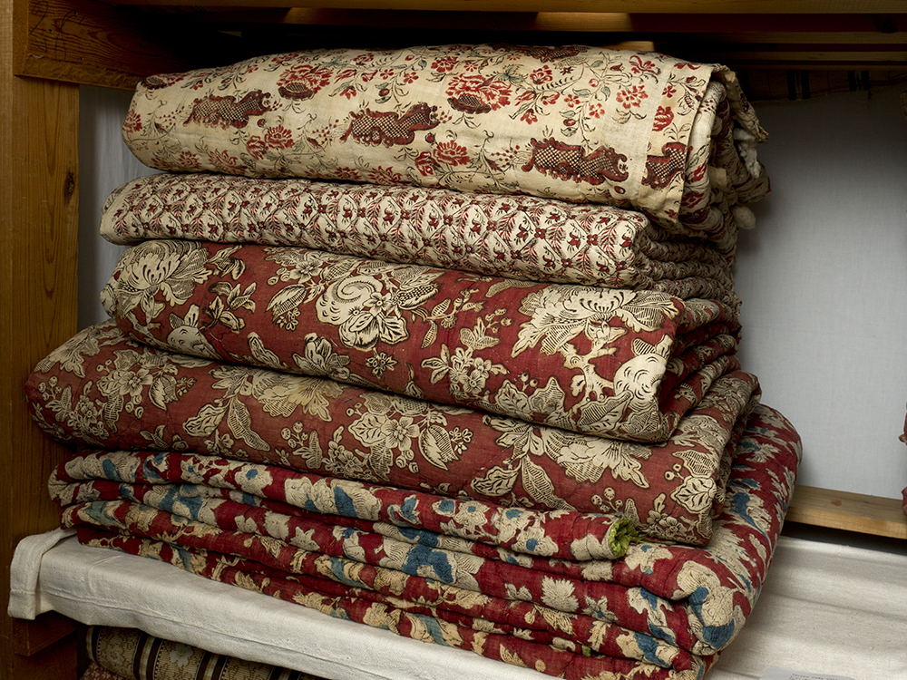 18th century bedcovers with brightly coloured printed patterns are kept in Gripsholm Castle's storehouse. 